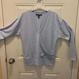 White House Black Market baby blue sweater Sz M fits L too.